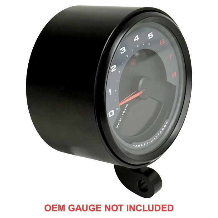 Two cylindrical motorcycle tachometer bezels from TC Bros., including the Pro Series 4 inch Gauge Relocation Bezel for Harley Davidson, in black and silver finishes with similar gauge faces featuring numbers and a red needle.