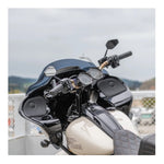 An Arlen Ness Welded Stainless Steel MX Tracker Handlebar - 1" (TBW & Cable) with a white handle and a brown handle.