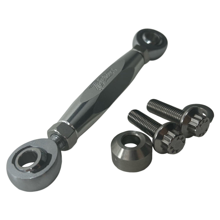 The TC Bros. M8 Softail Adjustable Brake Linkage for Mid Controls includes three adjustable rod end bearings in black, gold, and silver, each with engraved branding. Ideal for Harley Davidson M8 Softail mid controls, the set comprises two bolts, two lock nuts, and two washers for precise adjustments.