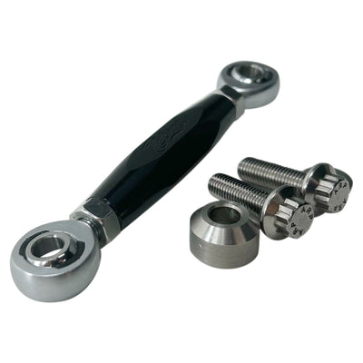 The TC Bros. M8 Softail Adjustable Brake Linkage for Mid Controls includes three adjustable rod end bearings in black, gold, and silver, each with engraved branding. Ideal for Harley Davidson M8 Softail mid controls, the set comprises two bolts, two lock nuts, and two washers for precise adjustments.