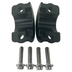 Close-up of TC Bros. Pro Series Clutch and Brake Perch Clamps for 1984-Up Harley-Davidson motorcycles, designed for 1" handlebars, showing control buttons, bolts, and the engraved TC Bros. brand name.
