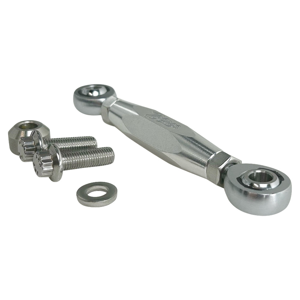 The TC Bros. M8 Softail Adjustable Brake Linkage for Mid Controls includes three adjustable rod end bearings in black, gold, and silver, each with engraved branding. Ideal for Harley Davidson M8 Softail mid controls, the set comprises two bolts, two lock nuts, and two washers for precise adjustments.