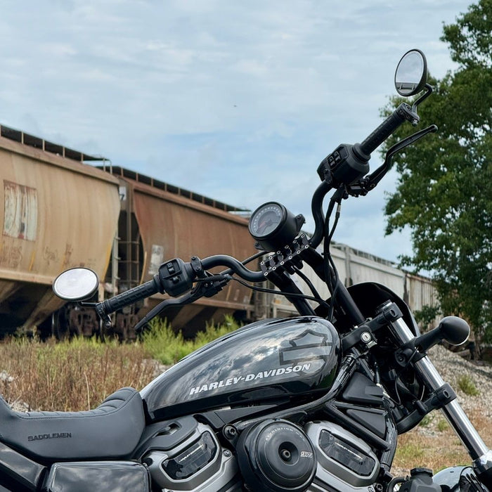 TC Bros. Pro Series Modular Risers for 2022-Up Harley-Davidson Nightster in black and silver, with angled heads and wire channels, are arranged against a white background.