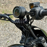 TC Bros. Pro Series Modular Risers for 2022-Up Harley-Davidson Nightster in black and silver, with angled heads and wire channels, are arranged against a white background.