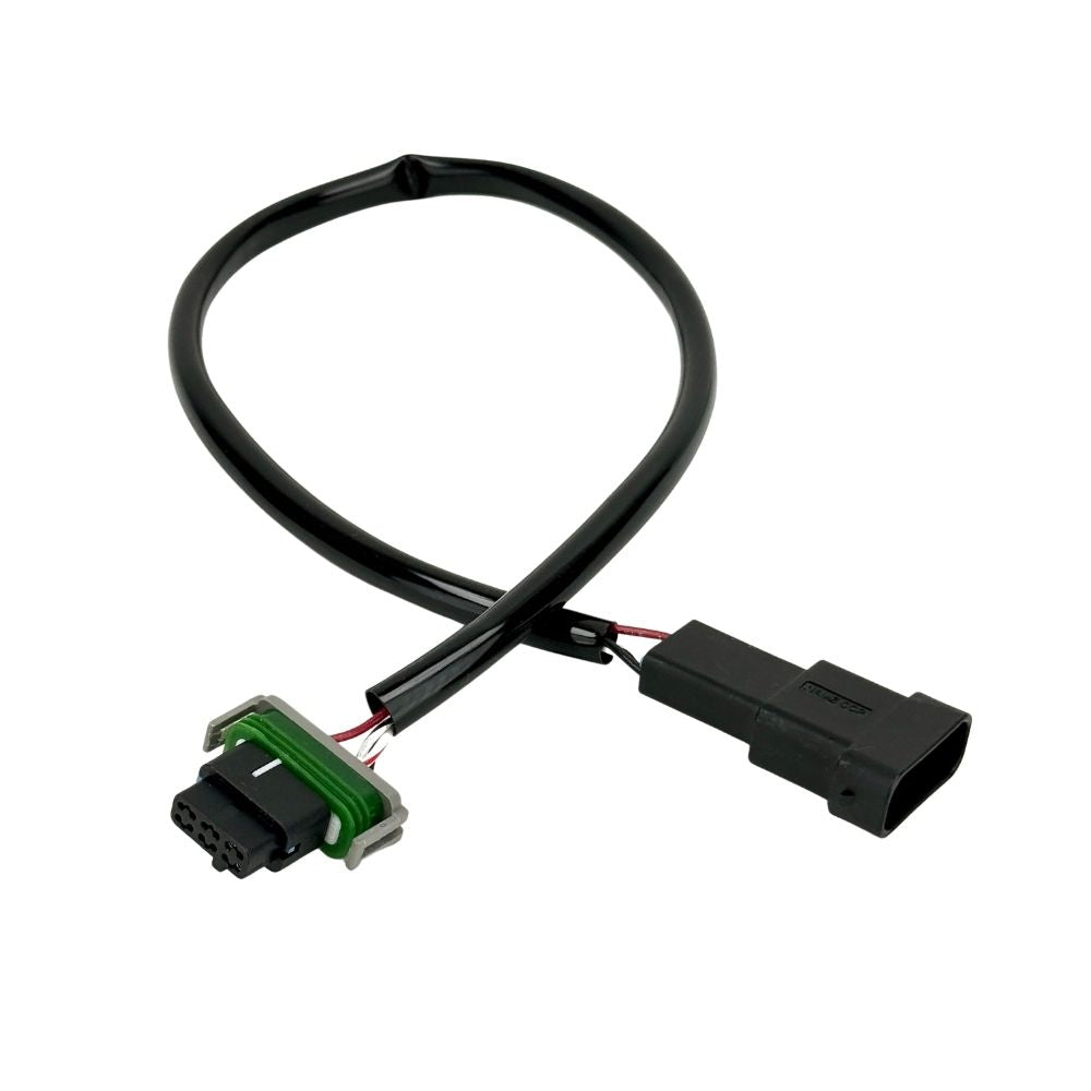 The Namz Speedometer/Cluster Extension Harness for 2022-Up Harley-Davidson Nightster is a black harness with two connectors and a green component, ideal for your bike.