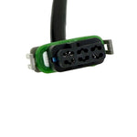 The Namz Speedometer/Cluster Extension Harness for 2022-Up Harley-Davidson Nightster is a black harness with two connectors and a green component, ideal for your bike.