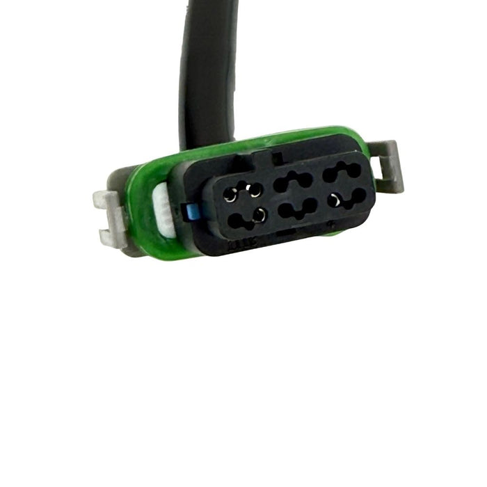 The Namz Speedometer/Cluster Extension Harness for 2022-Up Harley-Davidson Nightster is a black harness with two connectors and a green component, ideal for your bike.