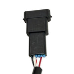 The Namz Speedometer/Cluster Extension Harness for 2022-Up Harley-Davidson Nightster is a black harness with two connectors and a green component, ideal for your bike.