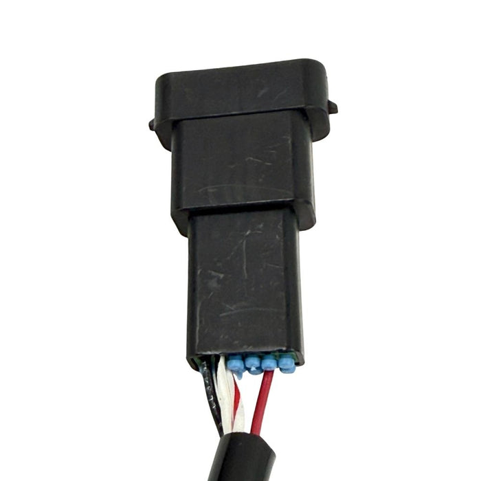 The Namz Speedometer/Cluster Extension Harness for 2022-Up Harley-Davidson Nightster is a black harness with two connectors and a green component, ideal for your bike.