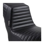 The back of a Le Pera Kickflip Seat - Pleated - Black - FXD '96-'03.