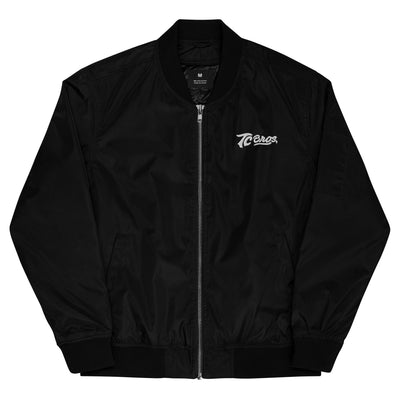 TC Bros. black bomber jacket, made of recycled polyester, with zipper and logo on the left chest.