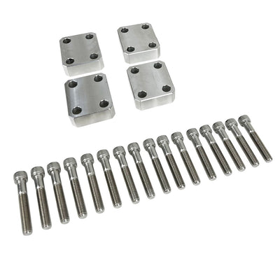 The TC Bros. Pro Series MX Floorboard Lift Kit, designed for Harley Davidson Bagger Touring Models, includes four black mounting blocks and sixteen silver bolts to enhance ground clearance, arranged in rows on a white background.