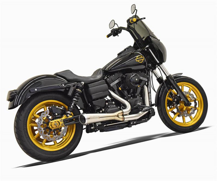 A black motorcycle with gold accents, featuring a windshield, large exhaust pipe, and spoke wheels fitted with a Bassani The Ripper Road Rage 2-into-1 Stainless Exhaust 06-17 FXD (w/Mids), 07-17 FXD/FXDWG (w/Forwards).