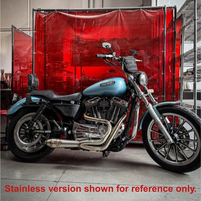 The SP Concepts Lanesplitter Exhaust in black, designed for Harley Davidson Sportster models from 2004-2013, features a logo and rests on concrete, enhancing the bike&
