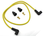 A Wyatt Gatling Cloth Braided Spark Plug Wire Kit 7mm - Yellow w/Blue Tracer with black handles, perfect for high-performance motor applications.