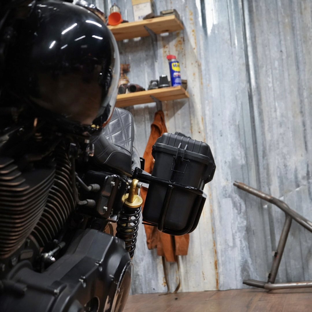 Two Speedwell Vigilante Saddlebags with sturdy handles and robust clasps, displayed against a plain white background.