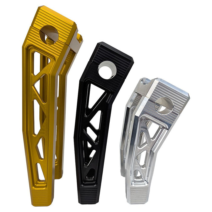 The TC Bros. Pro Series Pullback Truss Risers for Harley models by TC Bros. are CNC-machined, anodized metal handlebar risers available in gold, black, and silver. They feature a geometric design with visible bolts, perfect for Harley Davidson enthusiasts.