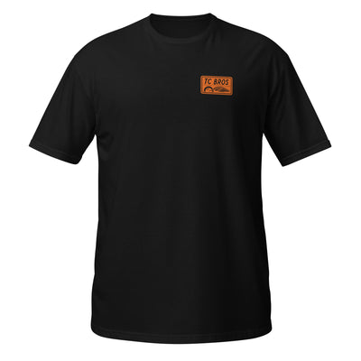 Badge - Black Tee, ring-spun cotton, with a small TC Bros. logo on the left chest area.