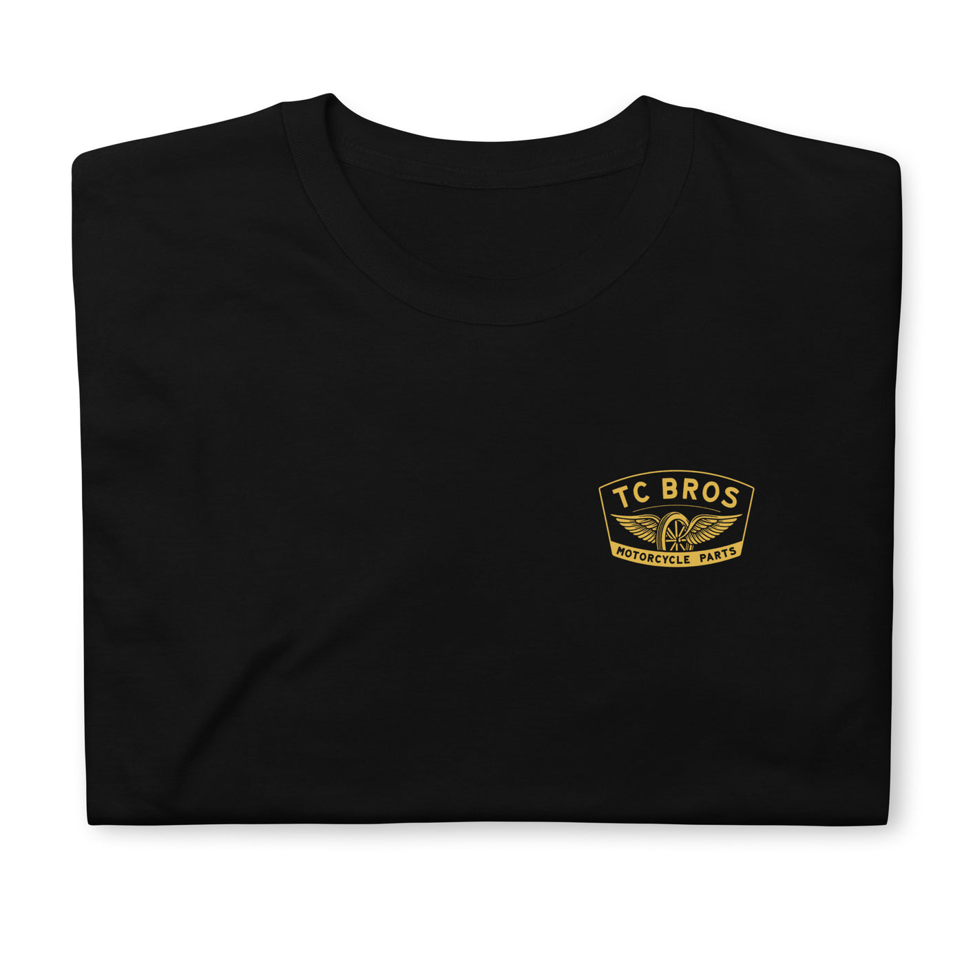 Gold Winged Wheel - Black Tee with TC Bros. logo on the left chest area.