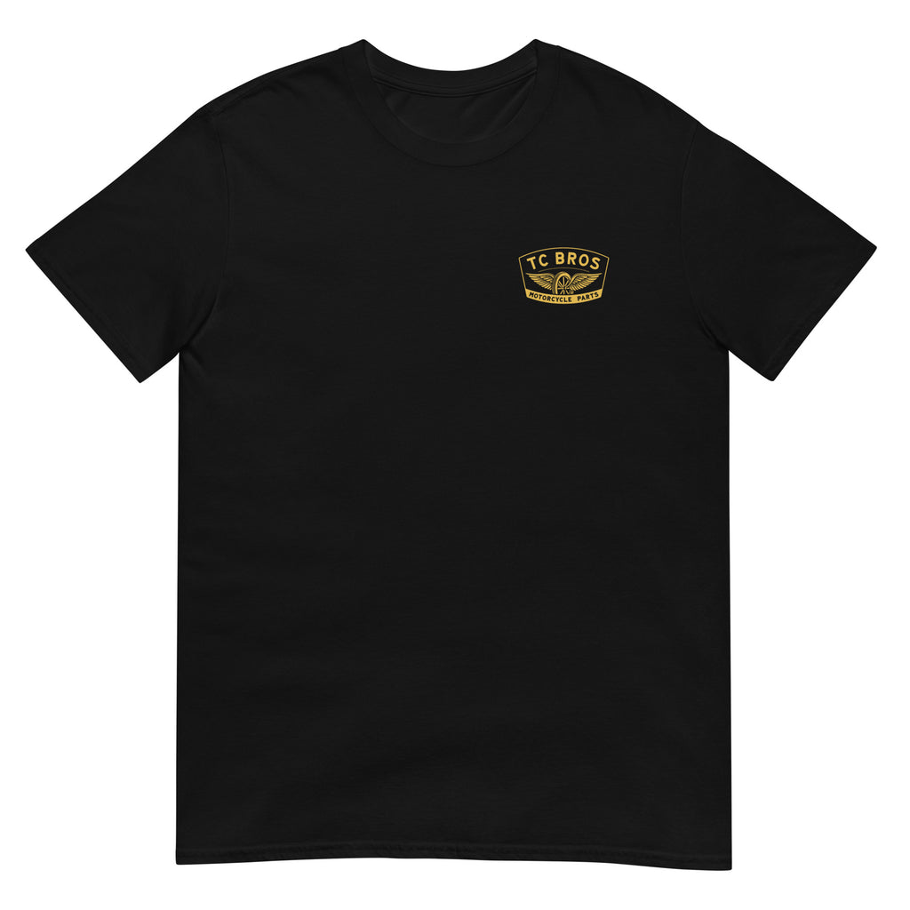 Gold Winged Wheel - Black Tee with TC Bros. logo on the left chest area.