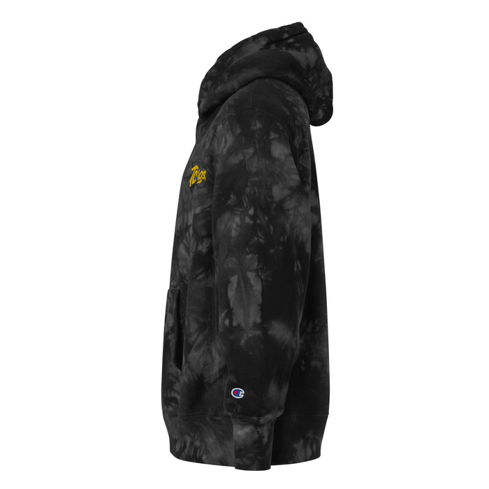 A black and gray camouflage patterned TC Bros. tie-dye hoodie with a yellow logo on the left chest.