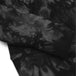 A black and gray camouflage patterned TC Bros. tie-dye hoodie with a yellow logo on the left chest.