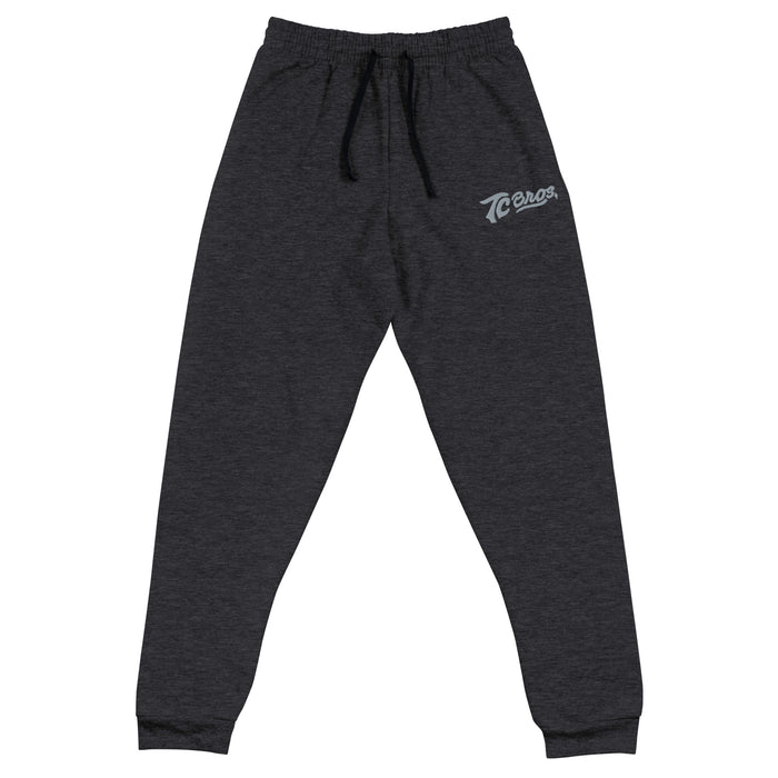 Dark gray Script Joggers with a drawstring and cuffed ankles, featuring a logo on the left thigh, made from cotton polyester fleece by TC Bros.