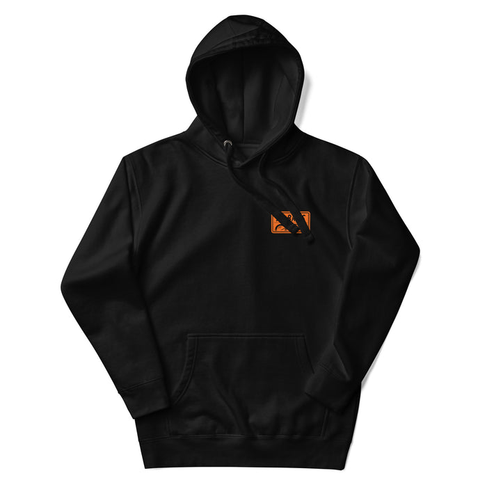 Badge Hoodie - Black/Orange, a classic streetwear piece, with a TC Bros logo embroidered on the left chest.