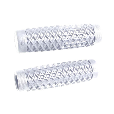 ODI Vans and Cult Grips for 1" handlebars feature a waffle pattern and come in black, brown, maroon, and orange. Textured rubber grips inspired by the Vans x CULT design are arranged on a white surface.