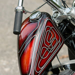 Three Moto Iron® round metal gas caps are shown: two Moto Iron Cam Lock Gas Caps for Harley-Davidson and Custom in black and silver closed, with one silver cap open to show its built-in opener, resembling an OEM bayonet or Harley gas cap.