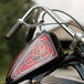 A close up of the TC Bros. 1" Rabbit Ears Handlebars - Black Smooth of a chopper motorcycle.