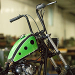 Two Moto Iron® Screw-in Fuel Caps for Harley-Davidson and Custom, one matte and one chrome, each with ribbed silicone inserts, are displayed against a white background.
