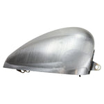 Moto Iron® 3.1 Gallon King Sportster Gas Tank for 1995-2003 Harley-Davidson Sportster shown unpainted, with included mounting hardware—bolts, washers, and rubber fittings—arranged in front of the tank.
