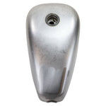 Moto Iron® 3.1 Gallon King Sportster Gas Tank for 1995-2003 Harley-Davidson Sportster shown unpainted, with included mounting hardware—bolts, washers, and rubber fittings—arranged in front of the tank.
