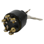 A Mid-USA Weatherproof Ignition Switch (with momentary start) 13/16" with a key on it.
