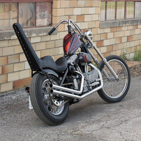 Moto Iron® Upsweep Exhaust System for Harley-Davidson Sportster 1986-2003 shown in chrome with mounting brackets and hardware, ideal for adding custom chopper style. Displayed on a white background.