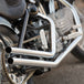 Moto Iron® Upsweep Exhaust System for Harley-Davidson Sportster 1986-2003 shown in chrome with mounting brackets and hardware, ideal for adding custom chopper style. Displayed on a white background.