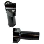 Two Moto Iron® 3.5" Black Forged Handlebar Risers for Harley, featuring a sleek black finish and mounting holes, stand upright on a white background.