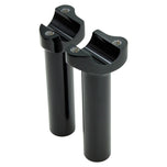 Two Moto Iron® 5.5" Black Forged Handlebar Risers for Harley, each a metal cylinder with threaded screw holes on top, stand vertically on a white background.