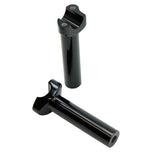 Two Moto Iron® 5.5" Black Forged Handlebar Risers for Harley, each a metal cylinder with threaded screw holes on top, stand vertically on a white background.