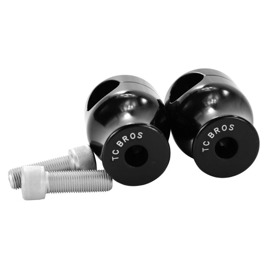 A pair of black metal TC Bros. 2" Black Springer Risers for 1" Diameter Handlebars.