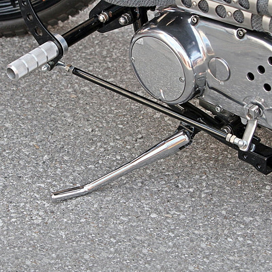 A close up of TC Bros Universal Linkage Kit metric forward control handlebars.