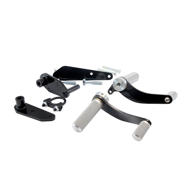 A set of black levers and hardware on a white background, specifically designed for the TC Bros. Honda Magna V45 Forward Controls Kit with forward controls.
