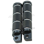 A pair of HardDrive Black Knurled Foot Pegs For Harley Models 2017-Earlier, billet black anodized and CNC machined, on a white background.