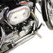 A close up of the engine of a TC Bros. Sportster Forward Controls Kit for 91-03 5 Speed motorcycle, USA made and with bolt on forward controls.