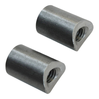 Two TC Bros 1 inch long coped steel bungs and bolts on a white background.
