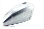 The Mid-USA 2.3 Gal. Sportster-Style Tank With Scalloped Sides, unpainted and ideal for custom builds, includes mounting hardware—bolts, washers, rubber grommets, and two black metal brackets—and is shown on a white background.