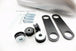 The Mid-USA 2.3 Gal. Sportster-Style Tank With Scalloped Sides, unpainted and ideal for custom builds, includes mounting hardware—bolts, washers, rubber grommets, and two black metal brackets—and is shown on a white background.