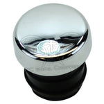 A shiny, round chrome metal cap with a black rubber base is photographed against a white background—this is the Mid-USA Push-In Oil Tank Fill Plug for Harley-Davidson motorcycles by Mid-USA.