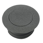 Close-up of the Pop-Up Gas Cap - Vented - Black by Moto Iron®, showcasing its round, textured billet aluminum structure with a central circular design and a vented mechanism.